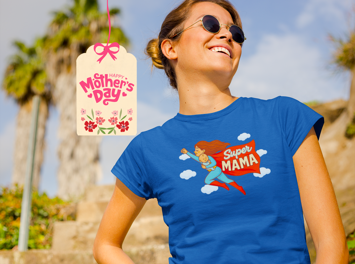 Happy woman wearing blue Super Mama T-shirt with Mother's Day gift tag – cute Mother's Day gift for mom, superhero mom shirt